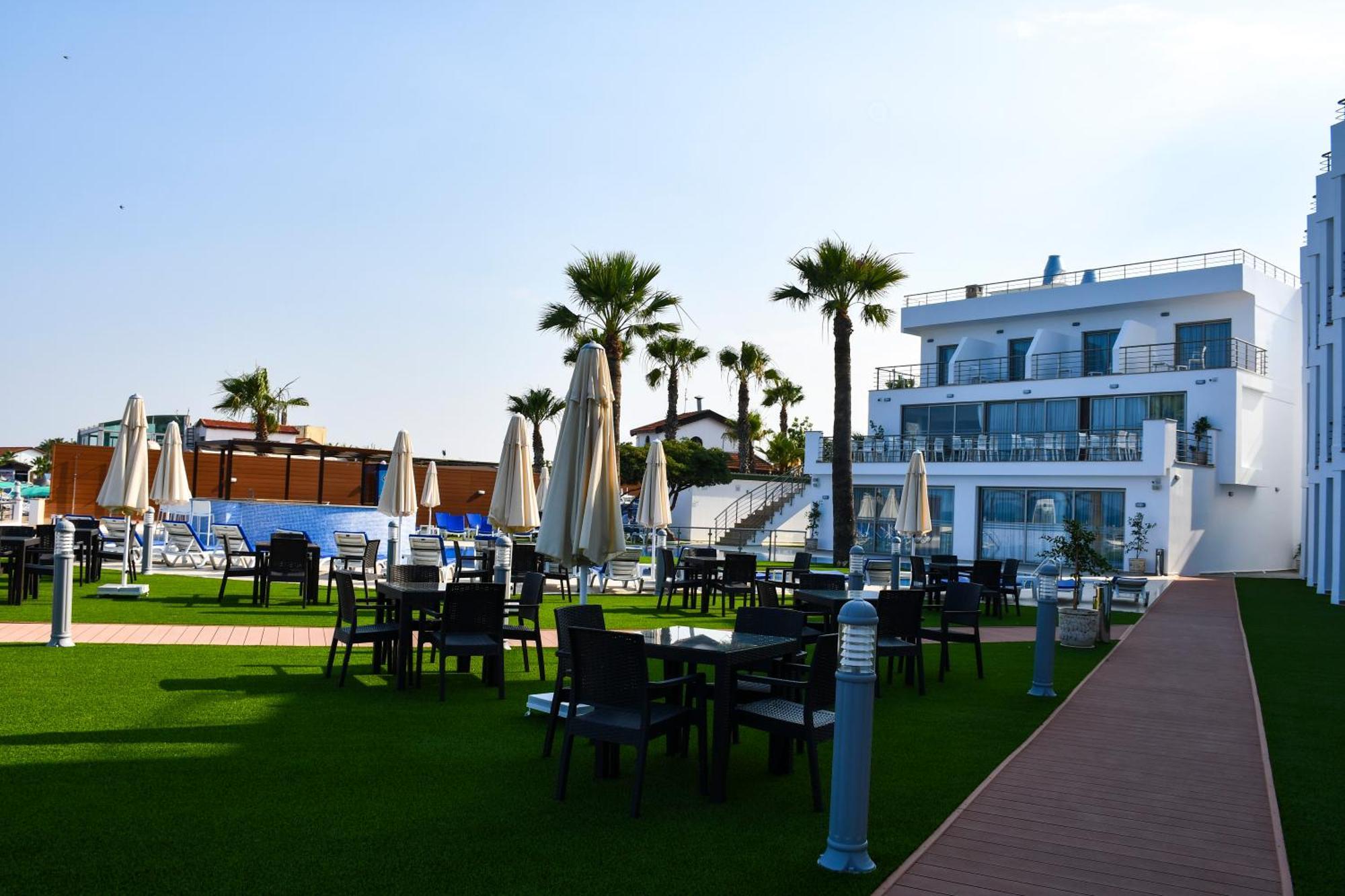 Mimoza Beach Hotel Agios Sergios Bagian luar foto